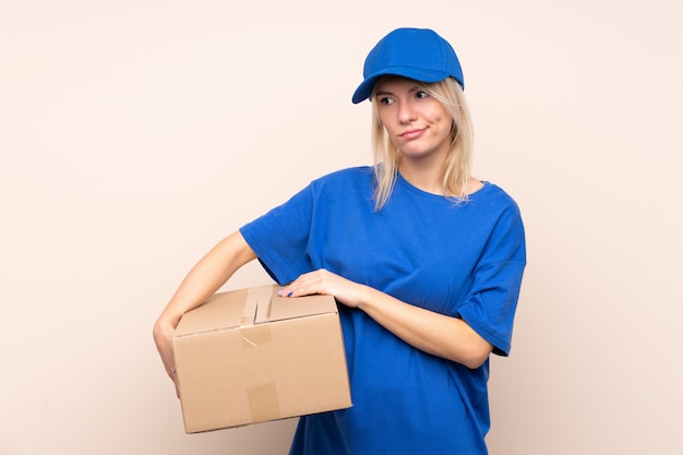 Young delivery woman thinking an idea