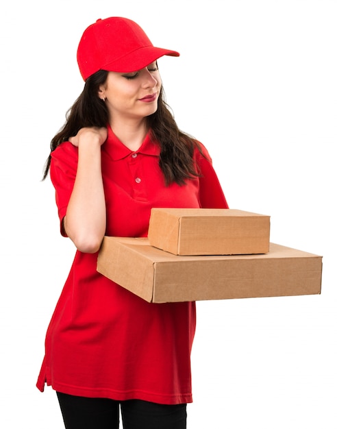 Young delivery woman with shoulder pain
