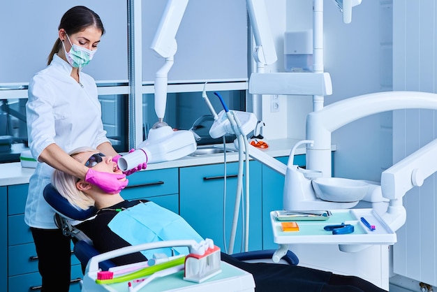 Young dentist at work in the office