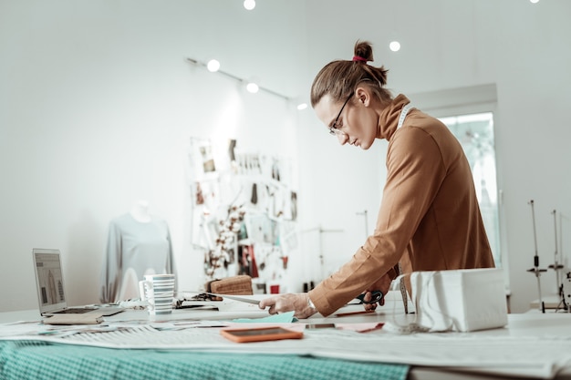 Young designer working in his studio