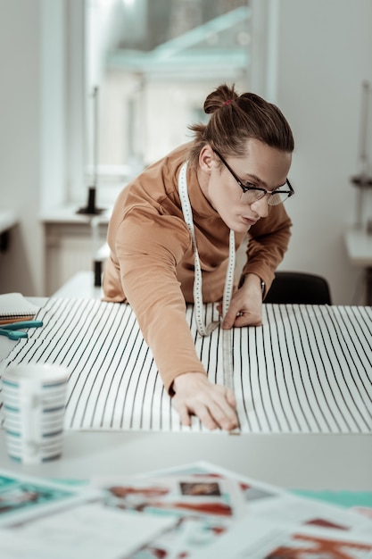 Young designer working in his studio