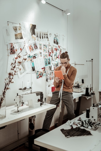 Young designer working in his studio