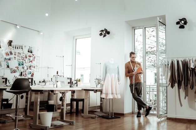 Young designer working in his studio