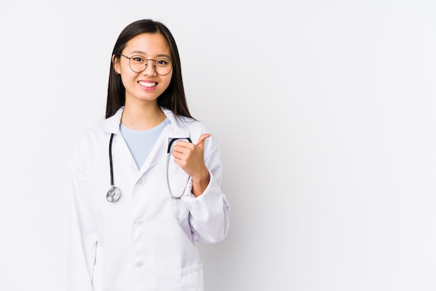 Young doctor asian woman smiling and raising thumb up