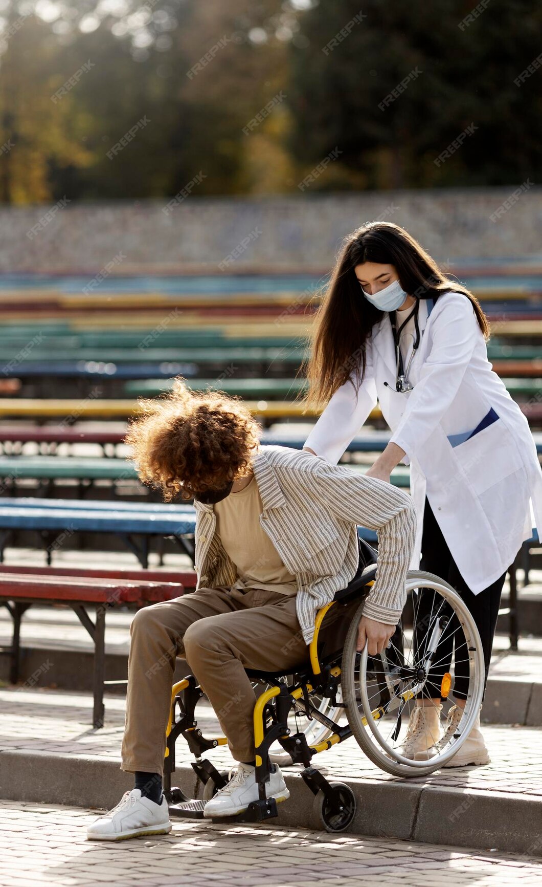 Premium Photo Young Doctor Helps A Patient Down The Stairs A Doctor premium-photo-young-doctor-helps-a-patient-down-the-stairs-a-doctor