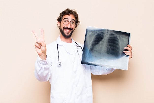 Young doctor holding a bone scan