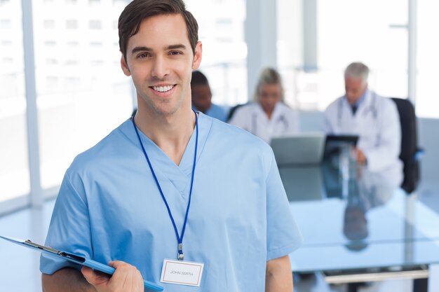 Young doctor holding a file