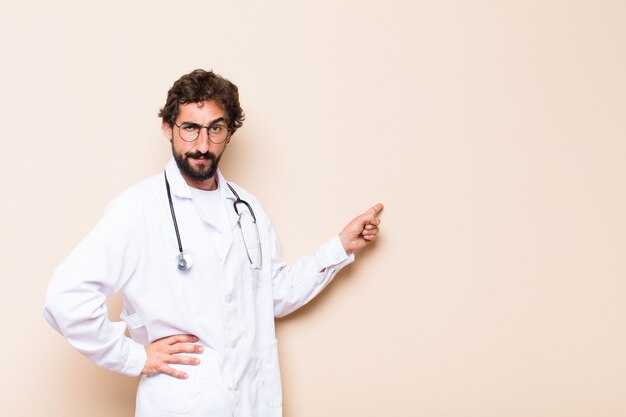 Young doctor pointing to the side