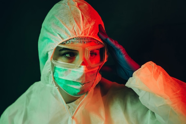 Young doctor in protective clothing