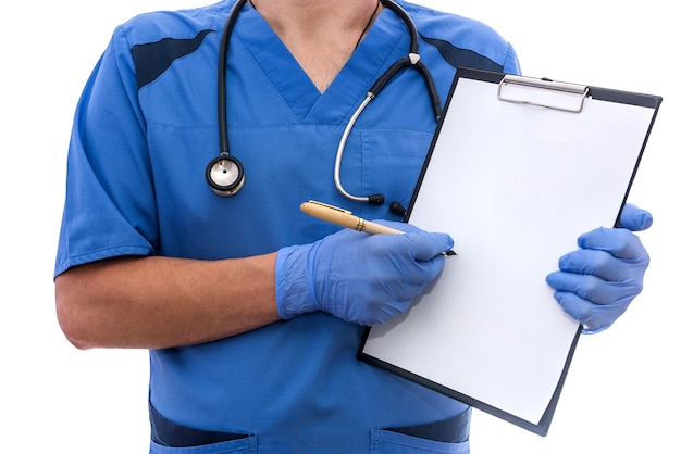 Young doctor showing on clipboard isolated on white.