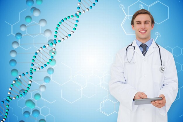 Young doctor using tablet pc against dna helix in blue with chemical structures