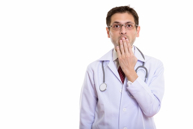 young doctor wearing eyeglasses while looking