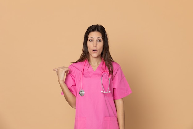 Young doctor wearing pink uniform