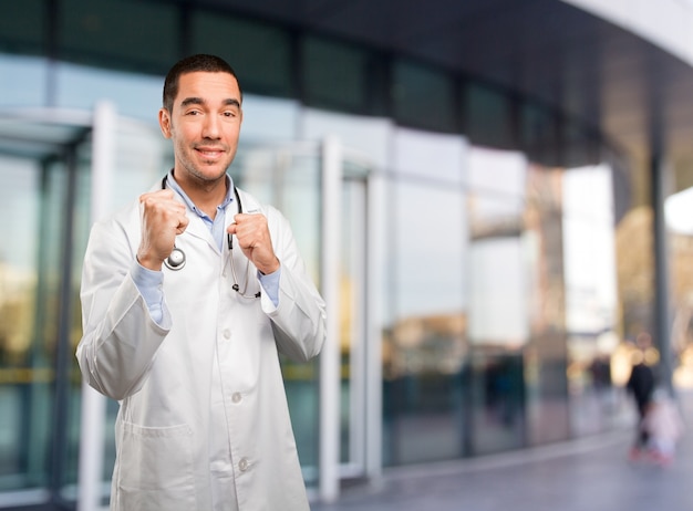 Young doctor with challenge gesture