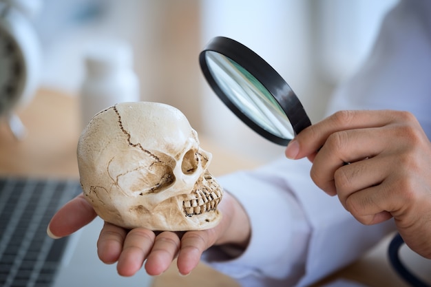 Young Doctor with a magnifying glass 