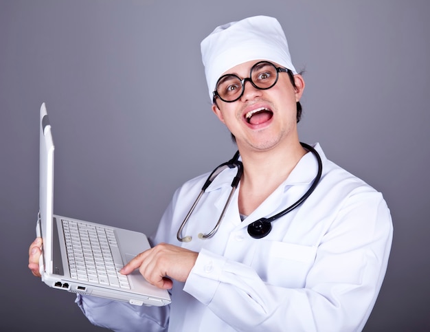 Young doctor with notebook.