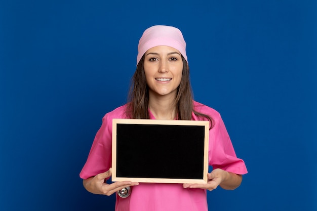 Young doctor with a pink uniform