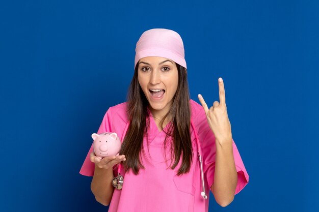 Young doctor with a pink uniform