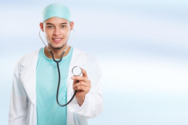 Young doctor with stethoscope heart breathing checkup check\
illness disease man copyspace copy space