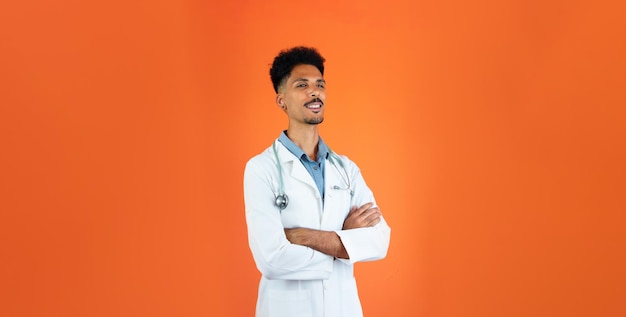 Young Doctor With Stethoscope Pointing Isolated