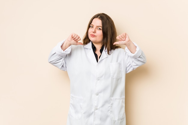 Young doctor woman feels proud and self confident