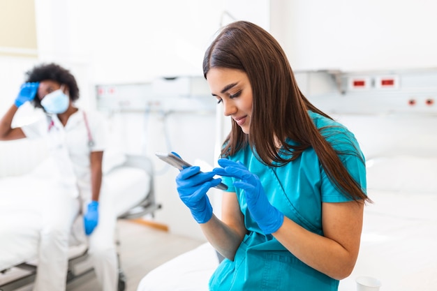 Young doctor woman and nurse taking a break