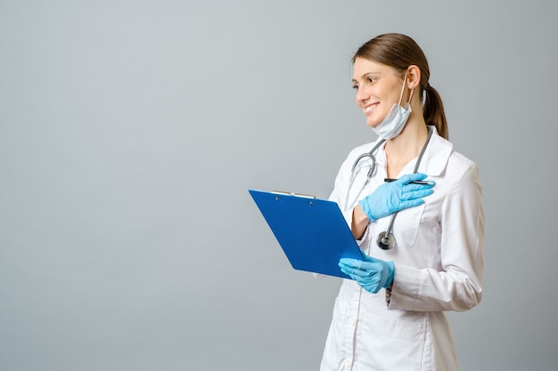 Young doctor woman smiling and cheerful