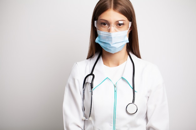 young doctor woman tired after work at her workplace