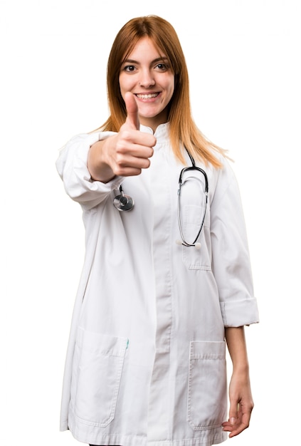 Young doctor woman with thumb up