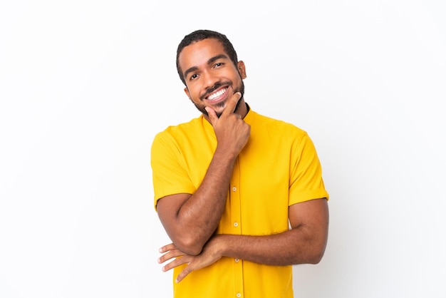 Young Ecuadorian man isolated on white background happy and smiling