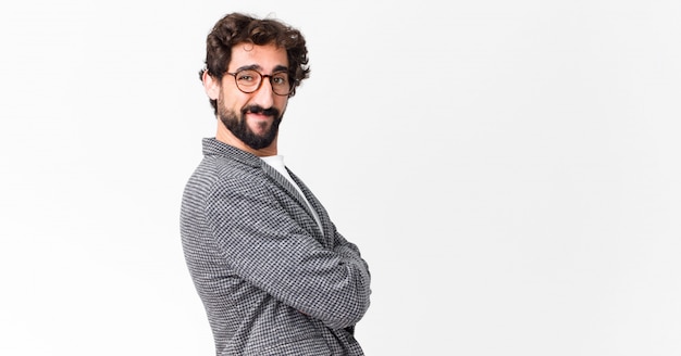 young elegant man smiling to camera with crossed arms