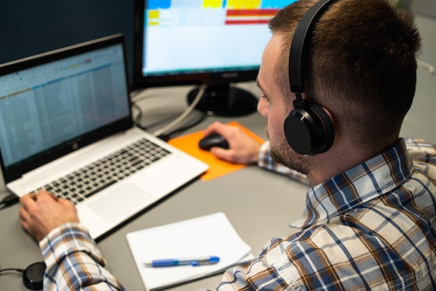 young employee call center talking with the client