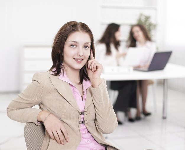 Young employee on the phone in the office