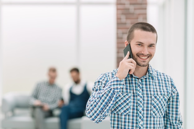 young employee standing in the office