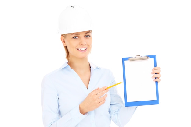 a young engineer with documents over white background