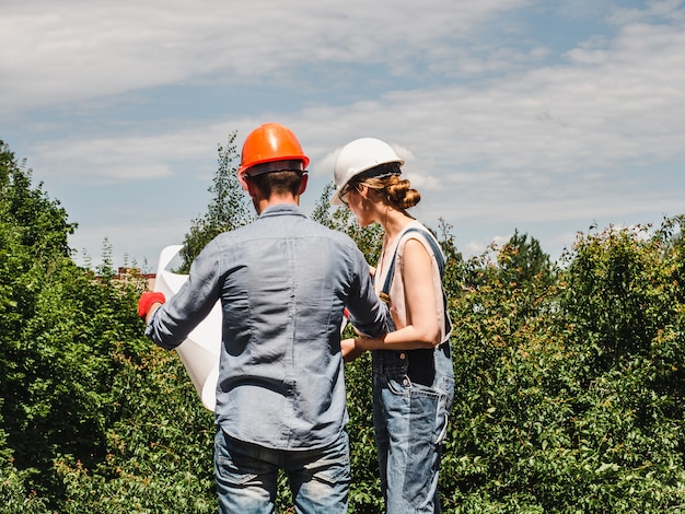 Young engineer woman and her subordinate worker