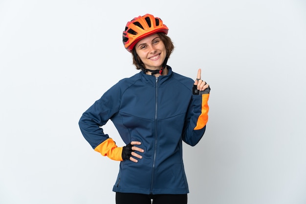 Young English cyclist woman isolated showing and lifting a finger in sign of the best