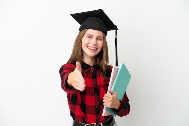 かなりの取引を閉じるために手を振って白い背景で隔離の若い英語の学生女性