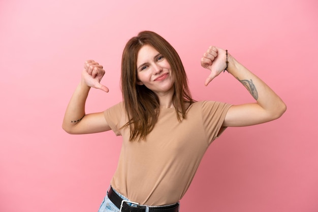 Young English woman isolated on pink background proud and selfsatisfied