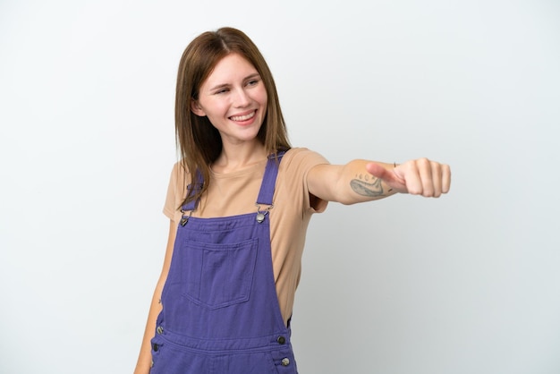 Young English woman isolated on white background giving a thumbs up gesture