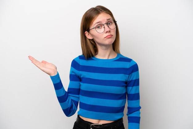 Young English woman isolated on white background having doubts