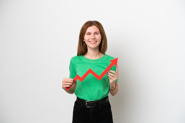 Young English woman isolated on white background holding a catching a rising arrow with happy expression