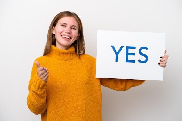 Young English woman isolated on white background holding a placard