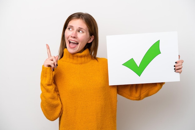 Photo young english woman isolated on white background holding a placard