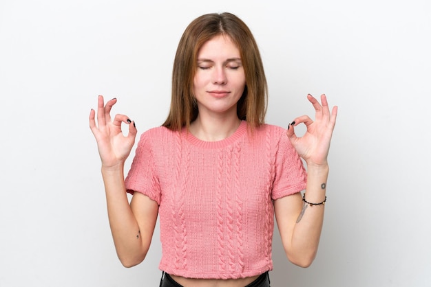 Young English woman isolated on white background in zen pose