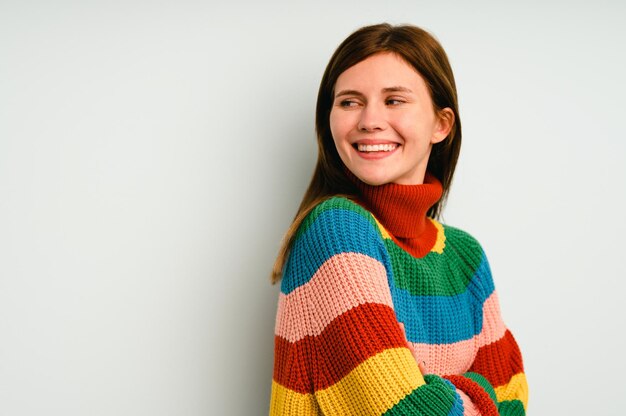 Young English woman isolated on yellow background