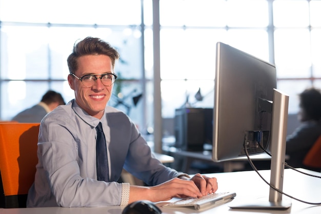 Young Entrepreneur Freelancer Working Using A computer In Coworking space