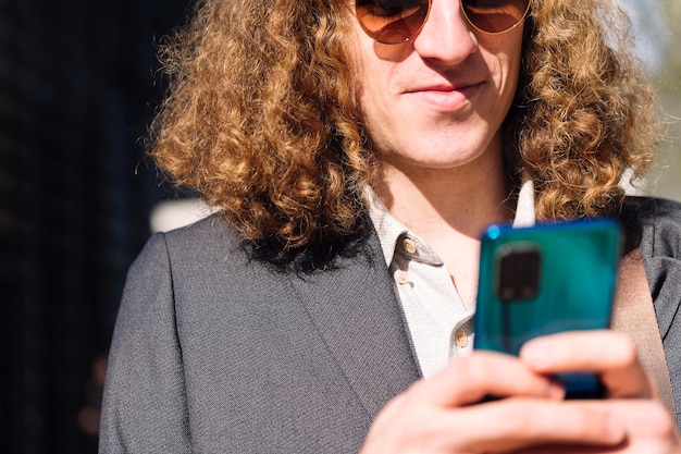 Young entrepreneur man using mobile phone