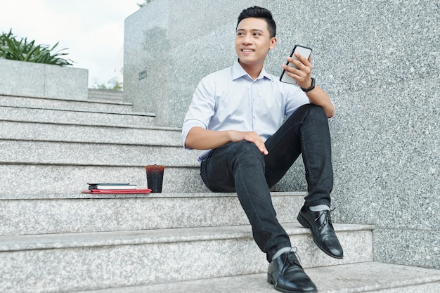 Young entrepreneur resting outdoors