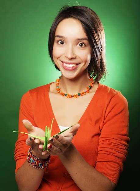 young expression woman with paper bird